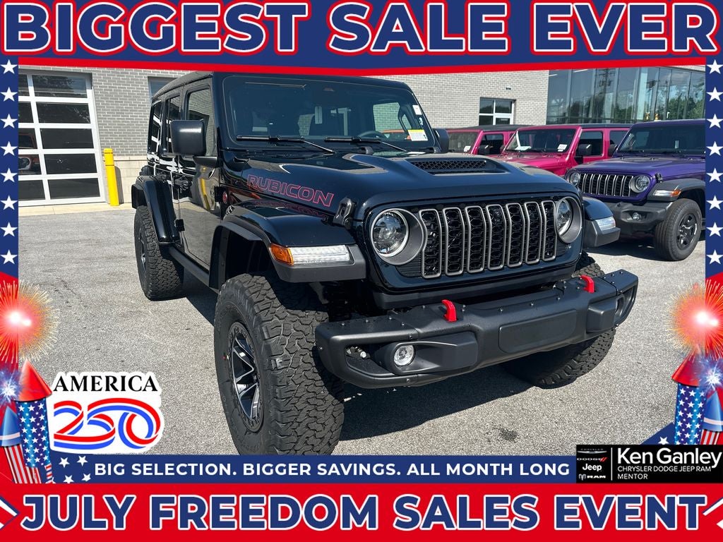 2026 Jeep Wrangler WRANGLER 4-DOOR RUBICON X in Black Clear-Coat Exterior Paint — front three-quarter view