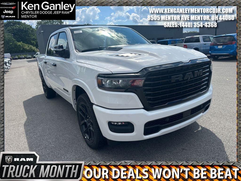 2026 RAM Ram 1500 RAM 1500 LARAMIE CREW CAB 4X4 5'7' BOX in Bright White Clear-Coat Exterior Paint — front three-quarter view