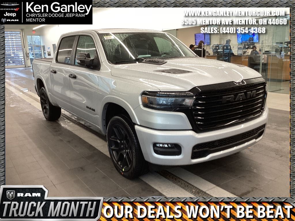 2026 RAM Ram 1500 RAM 1500 LARAMIE CREW CAB 4X4 5'7' BOX in Silver Zynith Exterior Paint — front three-quarter view