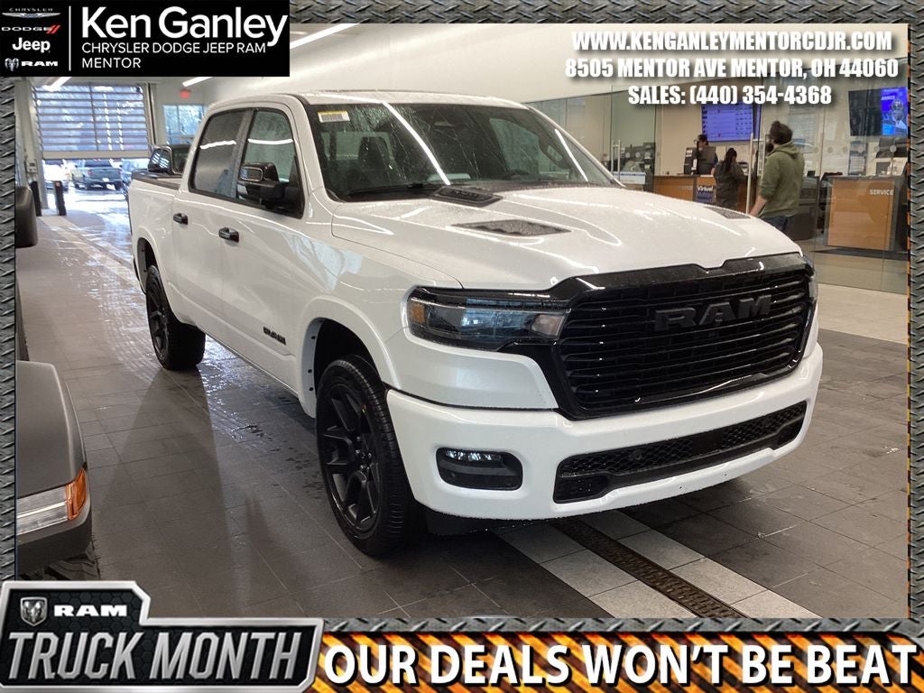 2026 RAM Ram 1500 RAM 1500 LARAMIE CREW CAB 4X4 5'7' BOX in Ivory White Tri-Coat Pearl-Coat Exterior Paint — front three-quarter view