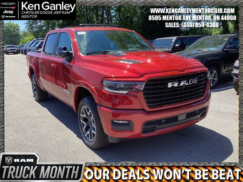 2026 RAM Ram 1500 RAM 1500 LARAMIE CREW CAB 4X4 5'7' BOX in Molten Red Pearl-Coat Exterior Paint — front three-quarter view