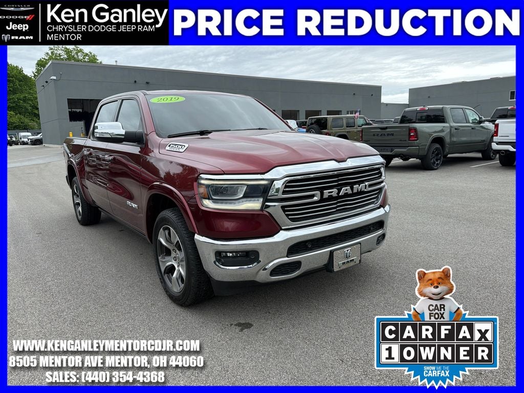 2019 RAM 1500 Laramie Crew Cab 4x4 5'7' Box in Delmonico Red Pearlcoat — front three-quarter view