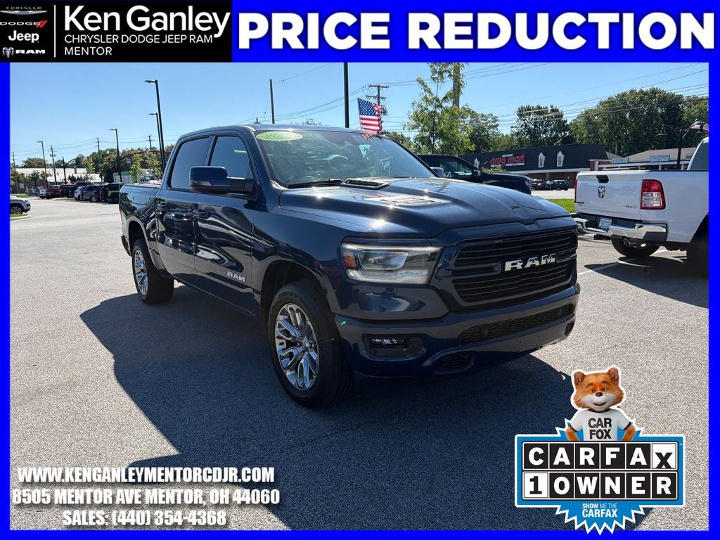 2024 RAM 1500 Laramie Crew Cab 4x4 5'7' Box in Patriot Blue Pearlcoat — front three-quarter view
