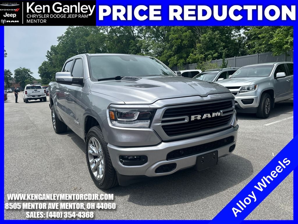 2024 RAM 1500 Laramie Crew Cab 4x4 5'7' Box in Billet Silver Metallic Clearcoat — front three-quarter view