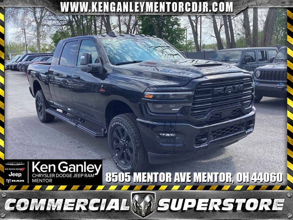 2026 RAM Ram 2500 RAM 2500 LARAMIE MEGA CAB 4X4 6'4' BOX in Diamond Black Crystal Pearl-Coat Exterior Paint — front three-quarter view