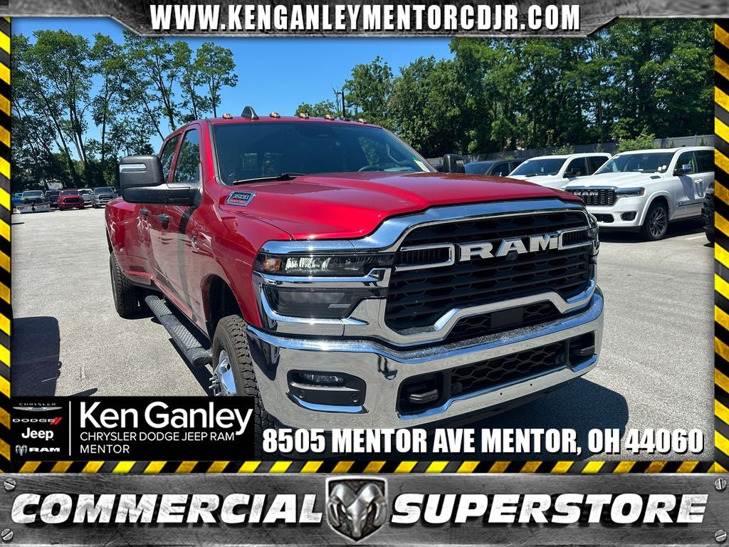 2026 RAM Ram 3500 RAM 3500 TRADESMAN CREW CAB 4X4 8' BOX in Molten Red Pearl-Coat Exterior Paint — front three-quarter view