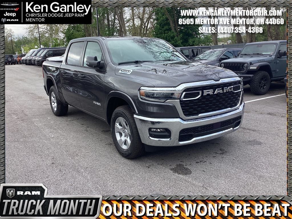 2026 RAM Ram 1500 RAM 1500 BIG HORN CREW CAB 4X4 5'7' BOX in Granite Crystal Metallic Clear-Coat Exterior Paint — front three-quarter view