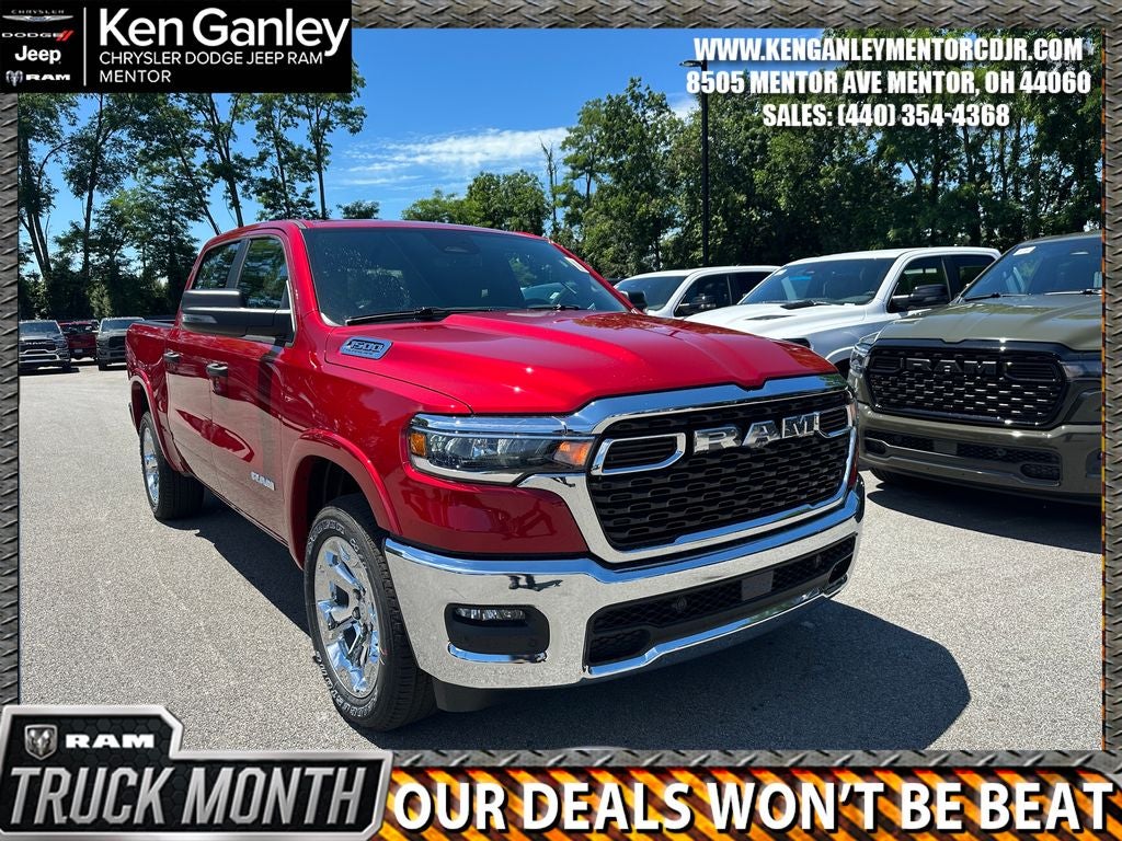 2026 RAM Ram 1500 RAM 1500 BIG HORN CREW CAB 4X4 5'7' BOX in Molten Red Pearl-Coat Exterior Paint — front three-quarter view