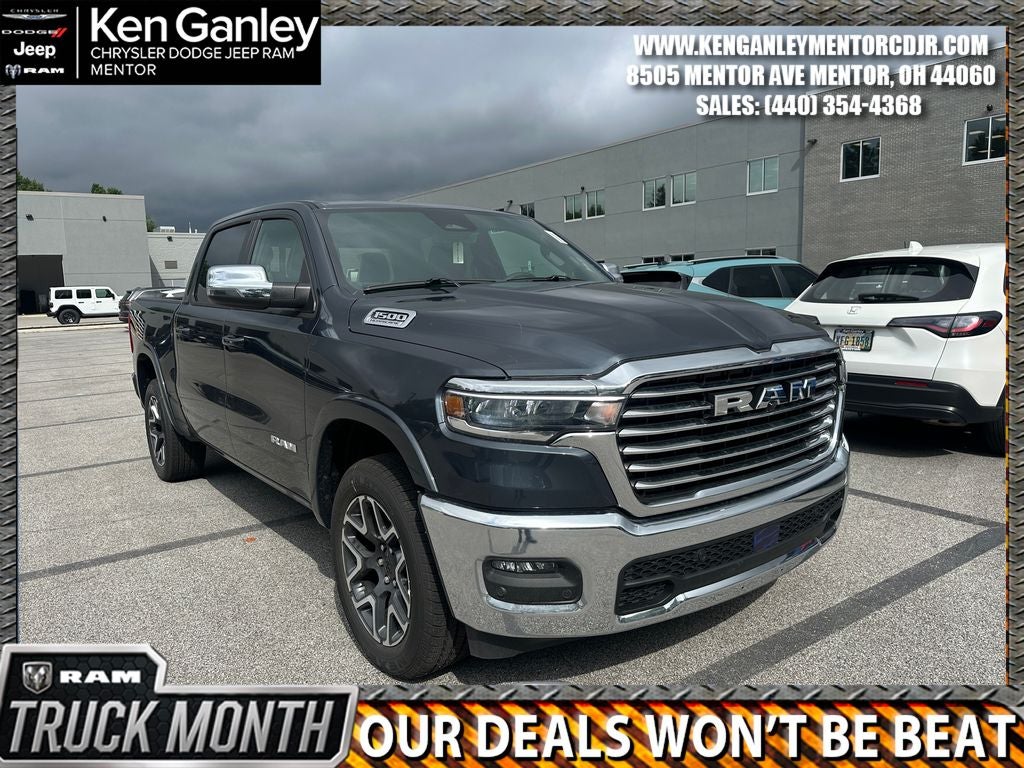 2026 RAM Ram 1500 RAM 1500 LARAMIE CREW CAB 4X4 5'7' BOX in Forged Blue Metallic Exterior Paint — front three-quarter view