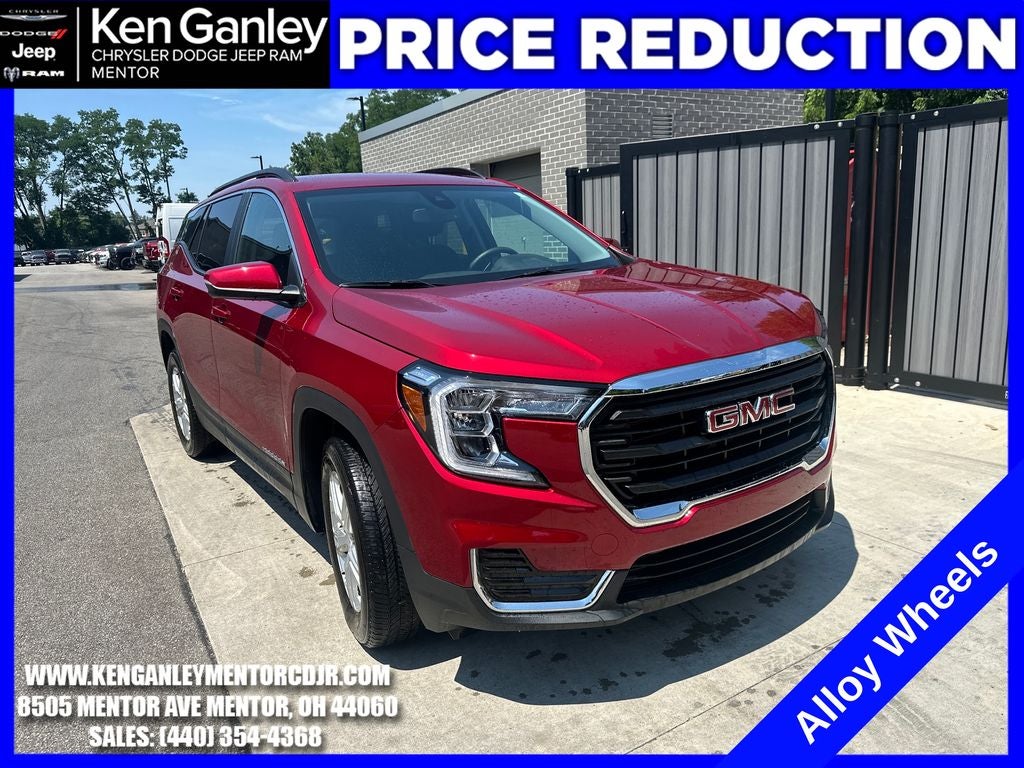 2023 GMC Terrain AWD SLE in Volcanic Red Tintcoat — front three-quarter view